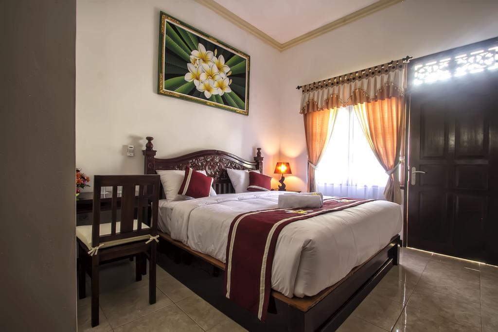 Frangipani Homestay Nusa Dua  Kamer foto