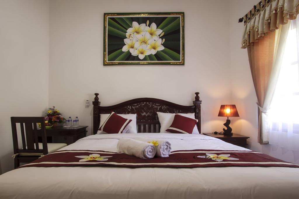 Frangipani Homestay Nusa Dua  Kamer foto